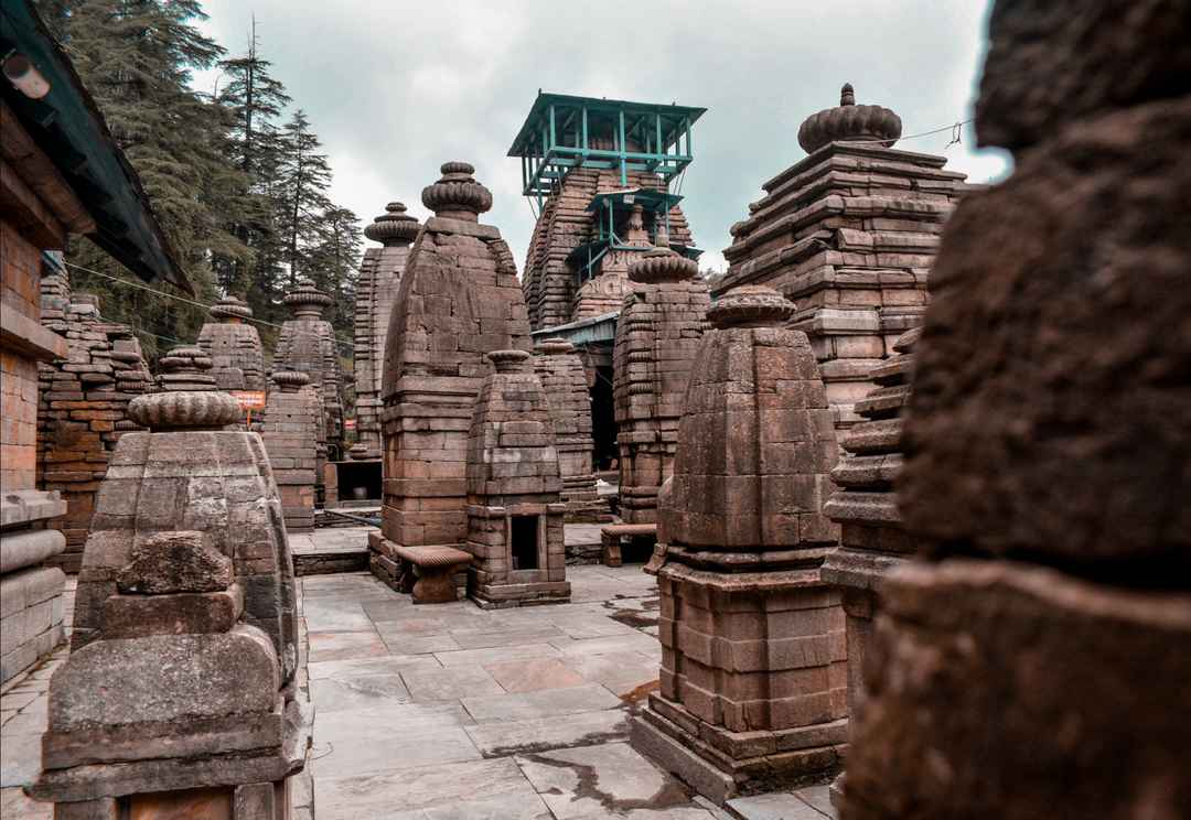 Jageshwar Temple Complex with ancient architecture and serene forest backdrop