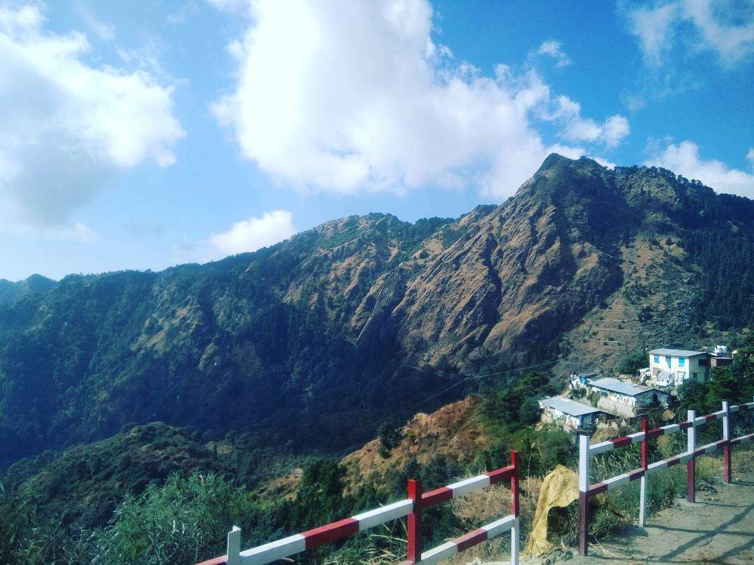 Panoramic view from Tiffin Top in Nainital with Naini Lake and hills