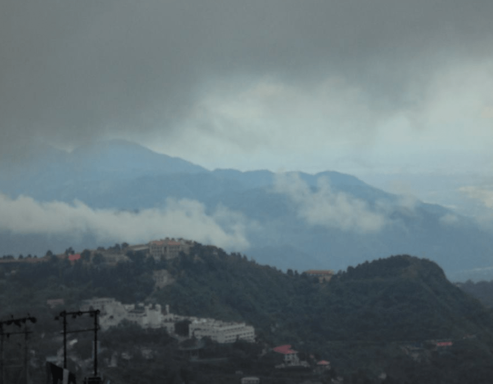 Monsoon view of Mussoorie with misty hills and lush greenery