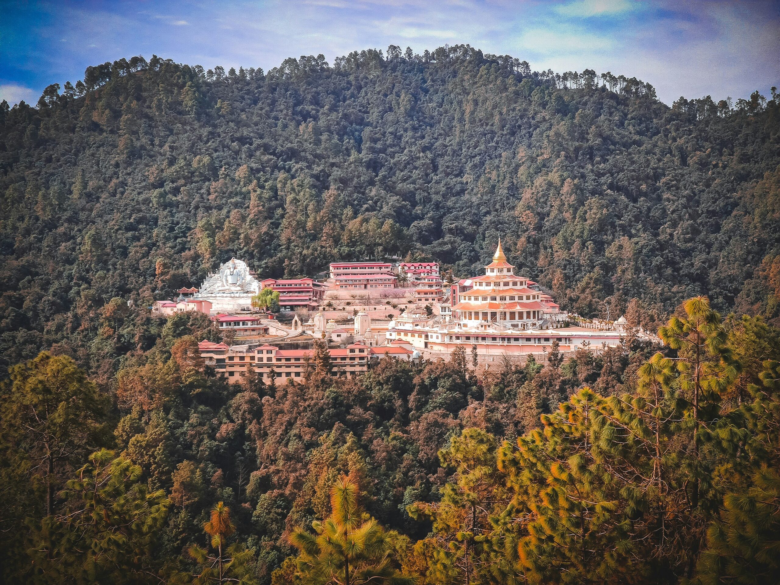 Dol Ashram in Almora with a scenic Himalayan backdrop and tranquil surroundings