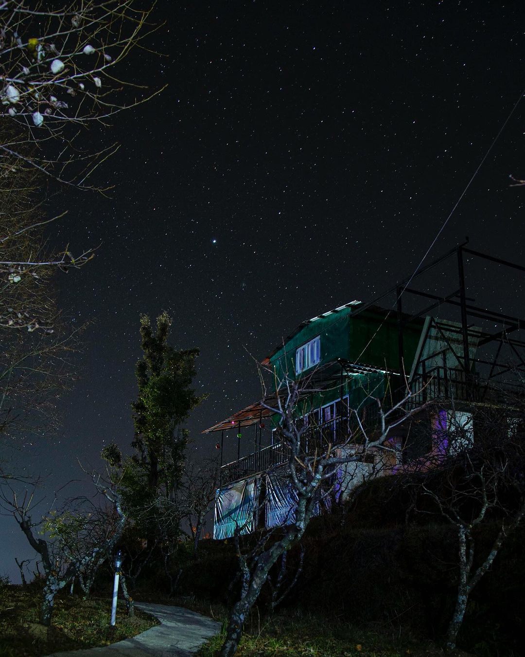 tarscapes Observatory Mukteshwar with telescopes under the night sky